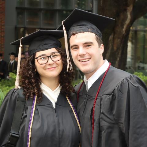 students posing for a photo during commencement 2024